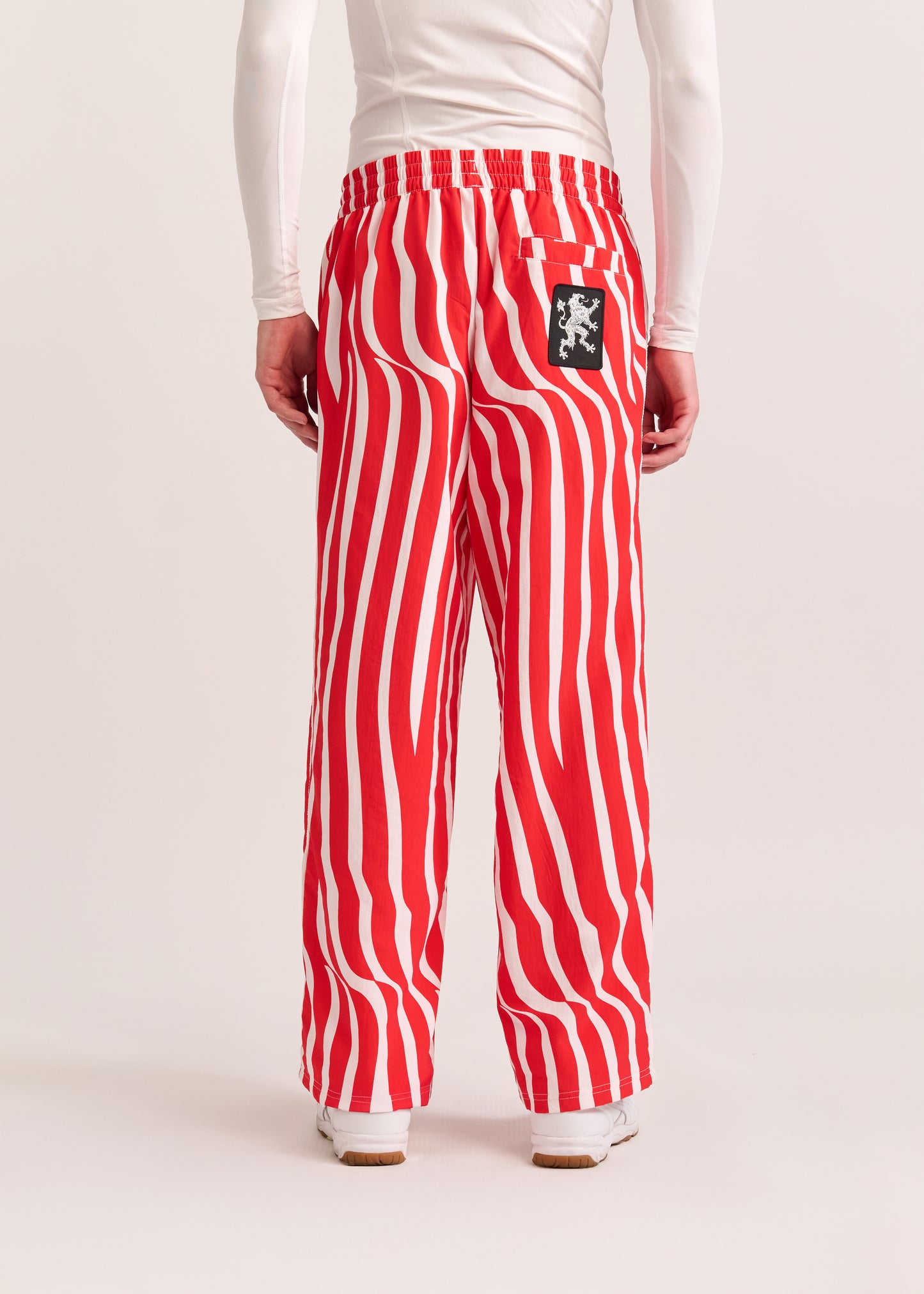 PUMA X LYM X CHIVAS RED AND WHITE SWIRL SPORT PANTS SELECT