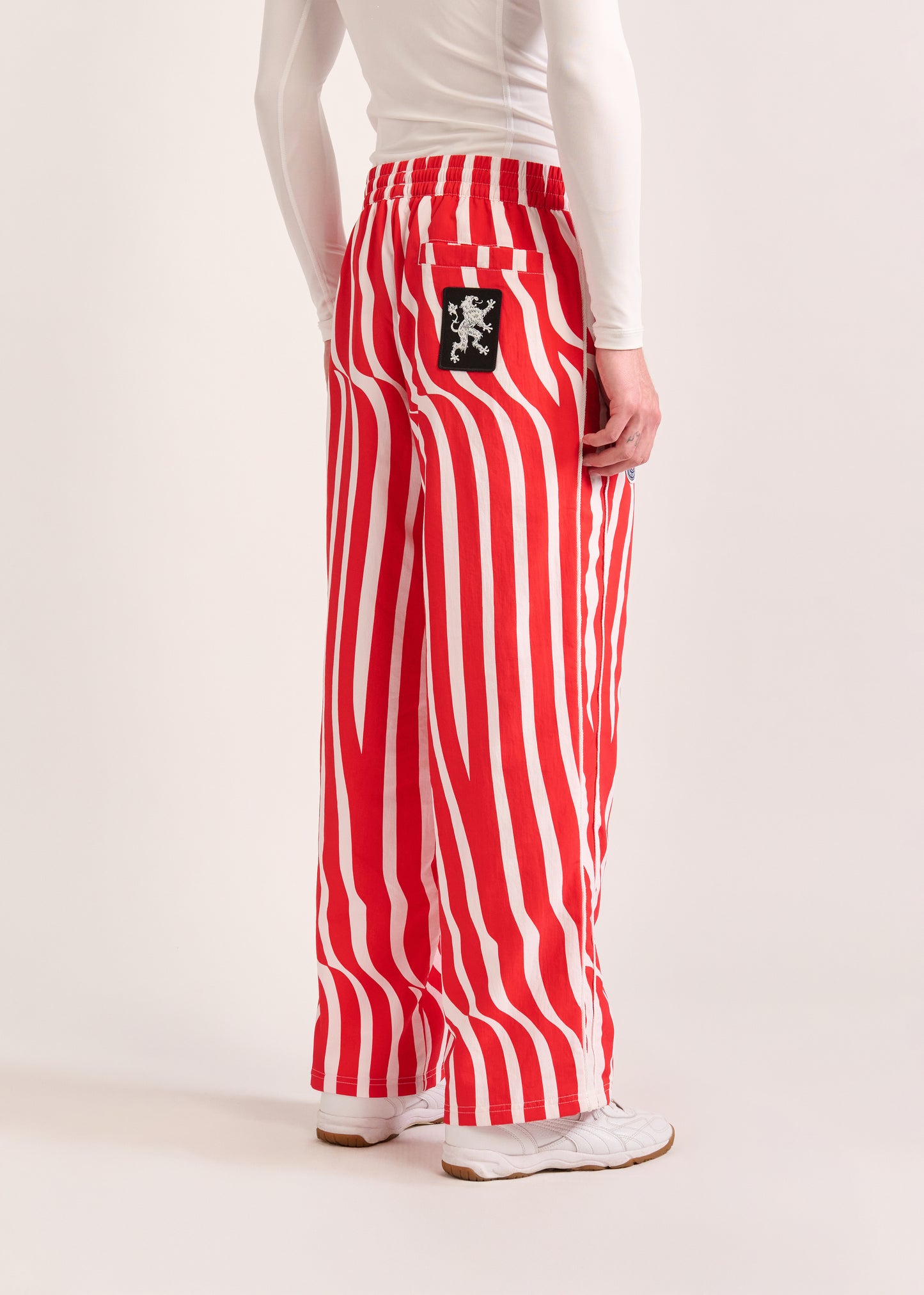 PUMA X LYM X CHIVAS RED AND WHITE SWIRL SPORT PANTS SELECT