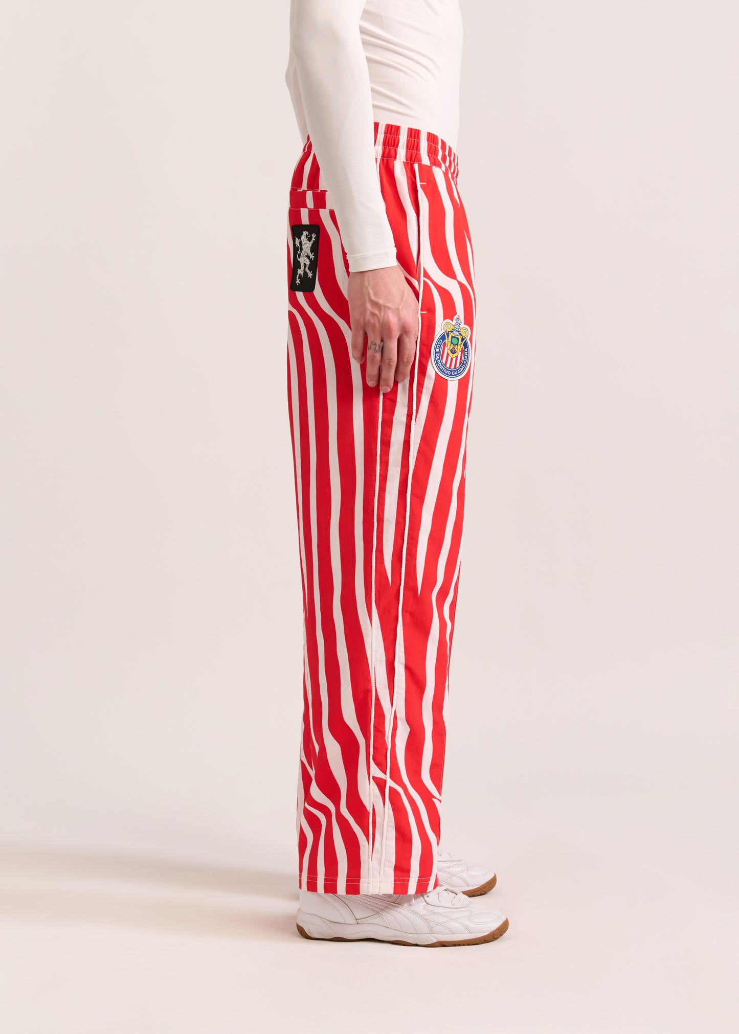 PUMA X LYM X CHIVAS RED AND WHITE SWIRL SPORT PANTS SELECT